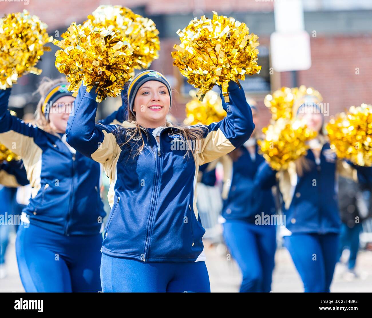 Cheerleaders with the Ringold High School Marching Band at the 2019 South Boston Saint Patrick's Day Parade. Stock Photo