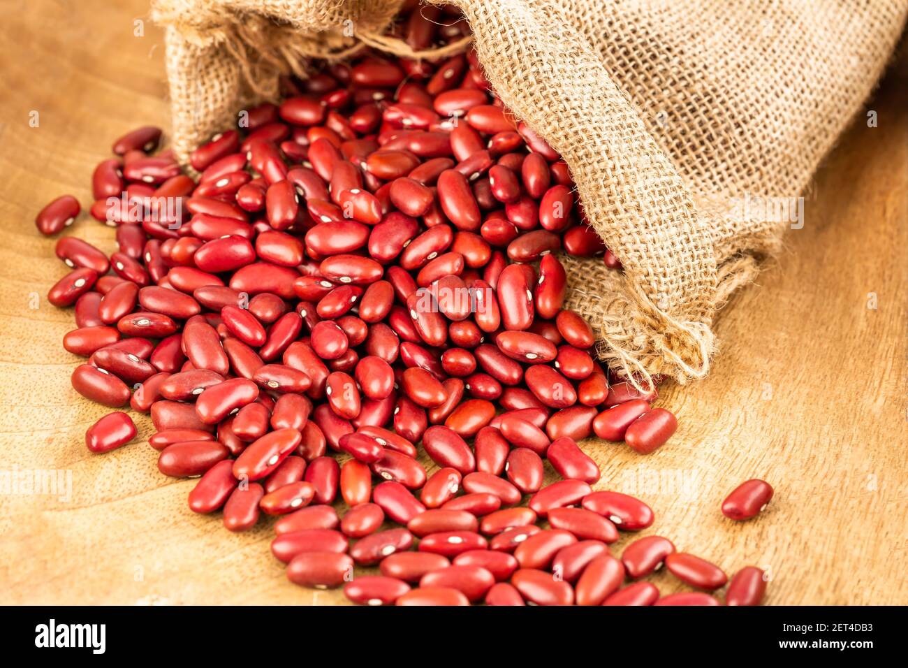 Red kidney beans in the burlap sack. Stock Photo