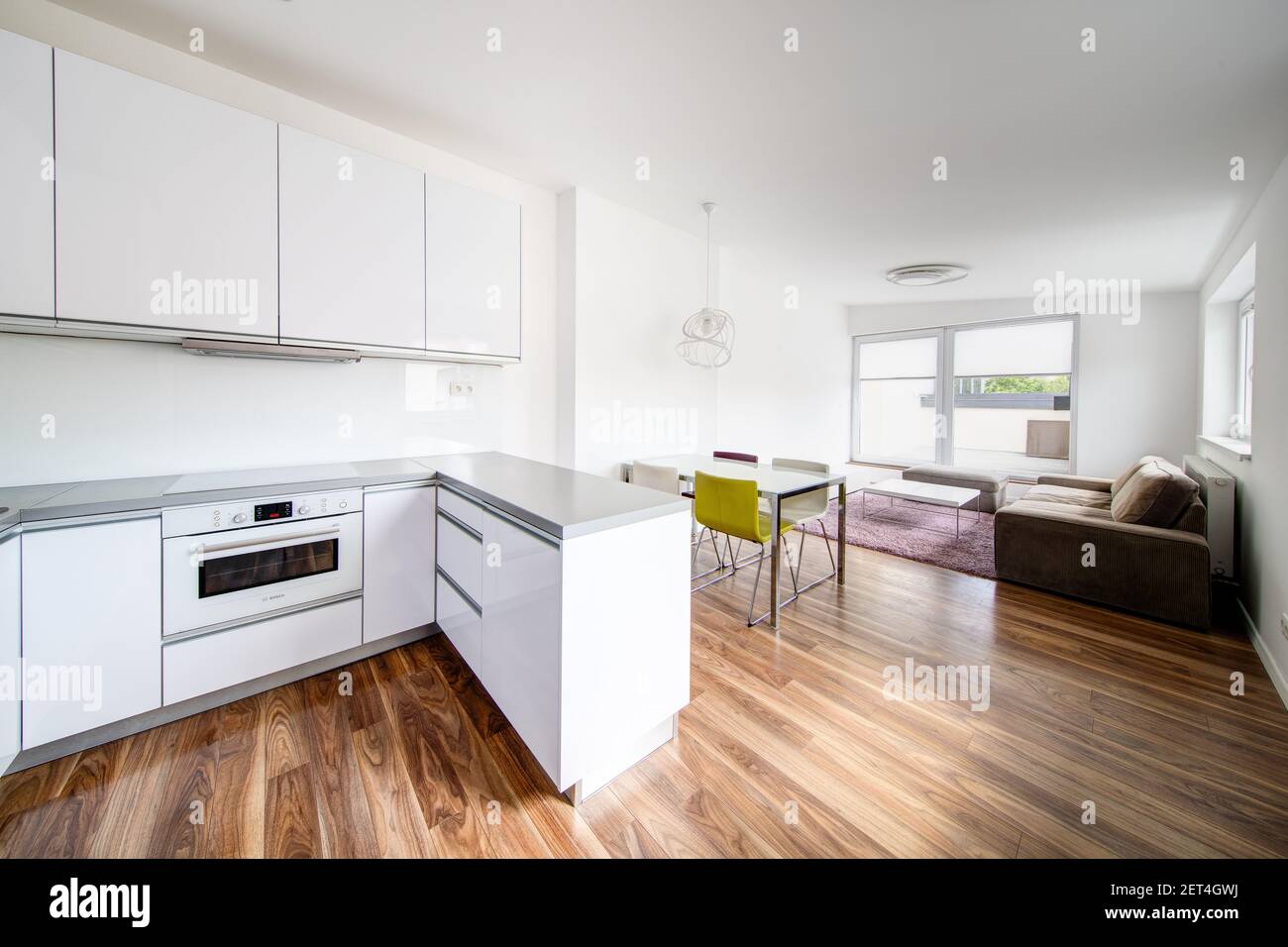 modern house with kitchen in bright colors Stock Photo