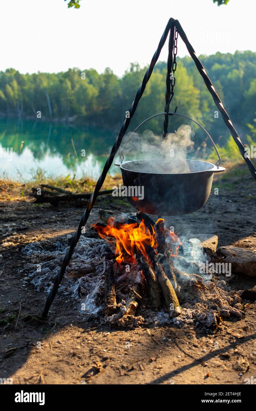 1+ Thousand Cooking On Fire Tripod Royalty-Free Images, Stock Photos &  Pictures