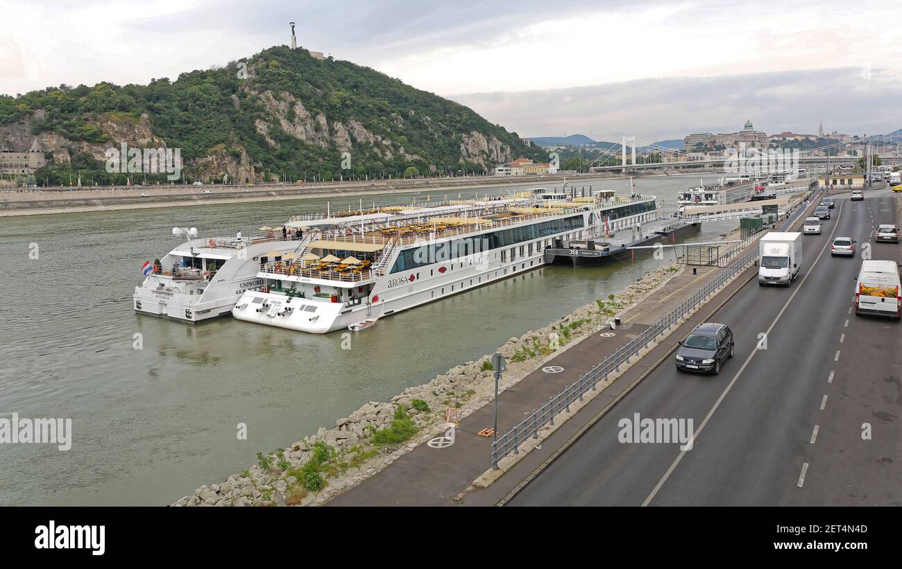 Budapest, Hungary - July 13, 2015: Moored Long Cruise Ships at Danube River Banks in Budapest, Hungary. Stock Photo