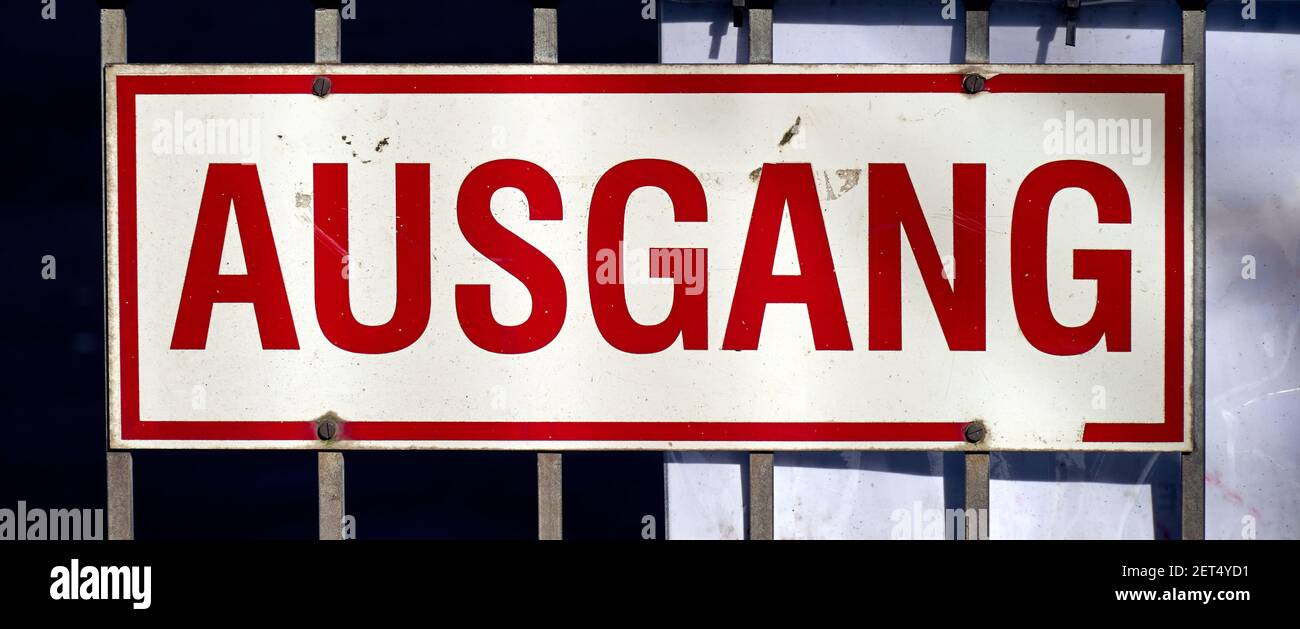 Lettering exit in German script in red letters on a white background