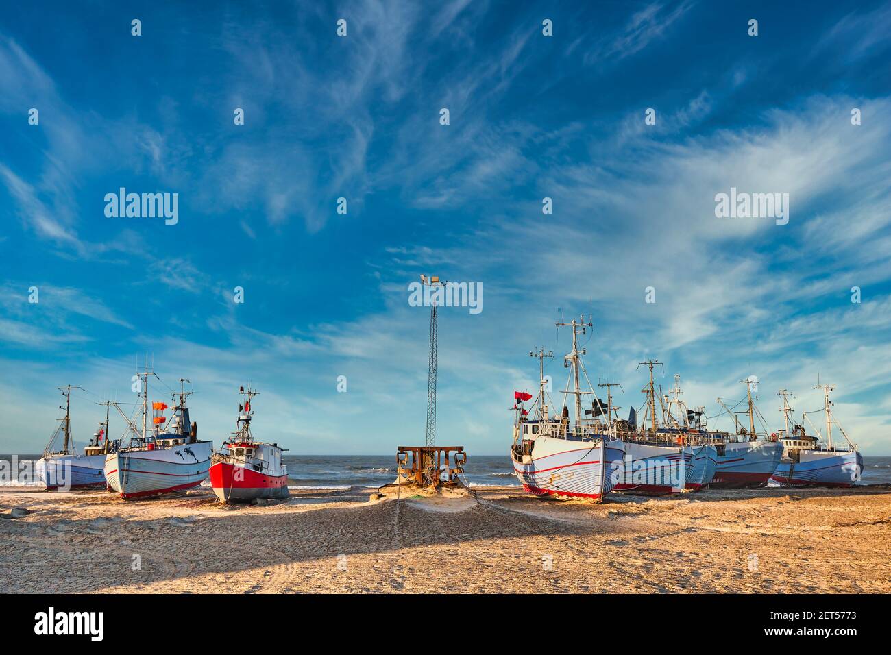 Coastal fishing boats vessels at Thorup beach in Western Denmark Stock