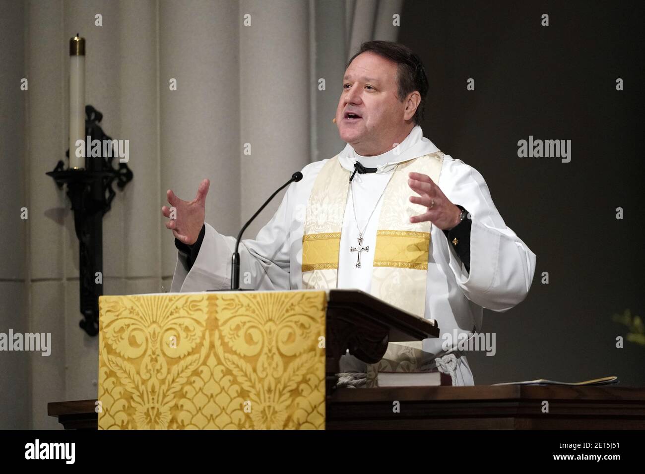 Rev. Russell J. Levenson Jr., gives the homily during a funeral service