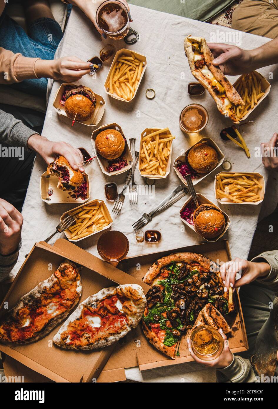 Lockdown family fast food dinner from delivery service. Flatlay of