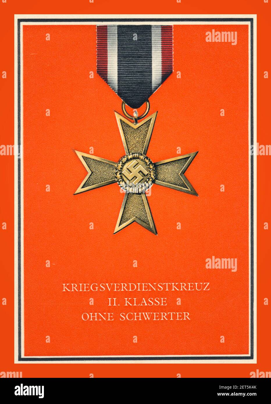 WW2 German Nazi Medal award 'kriegsverdienstkreuz 11.classe Ohne Schwerter' The Merit Cross Second Class without crossed swords. Featuring a Swastika Emblem in the centre Stock Photo
