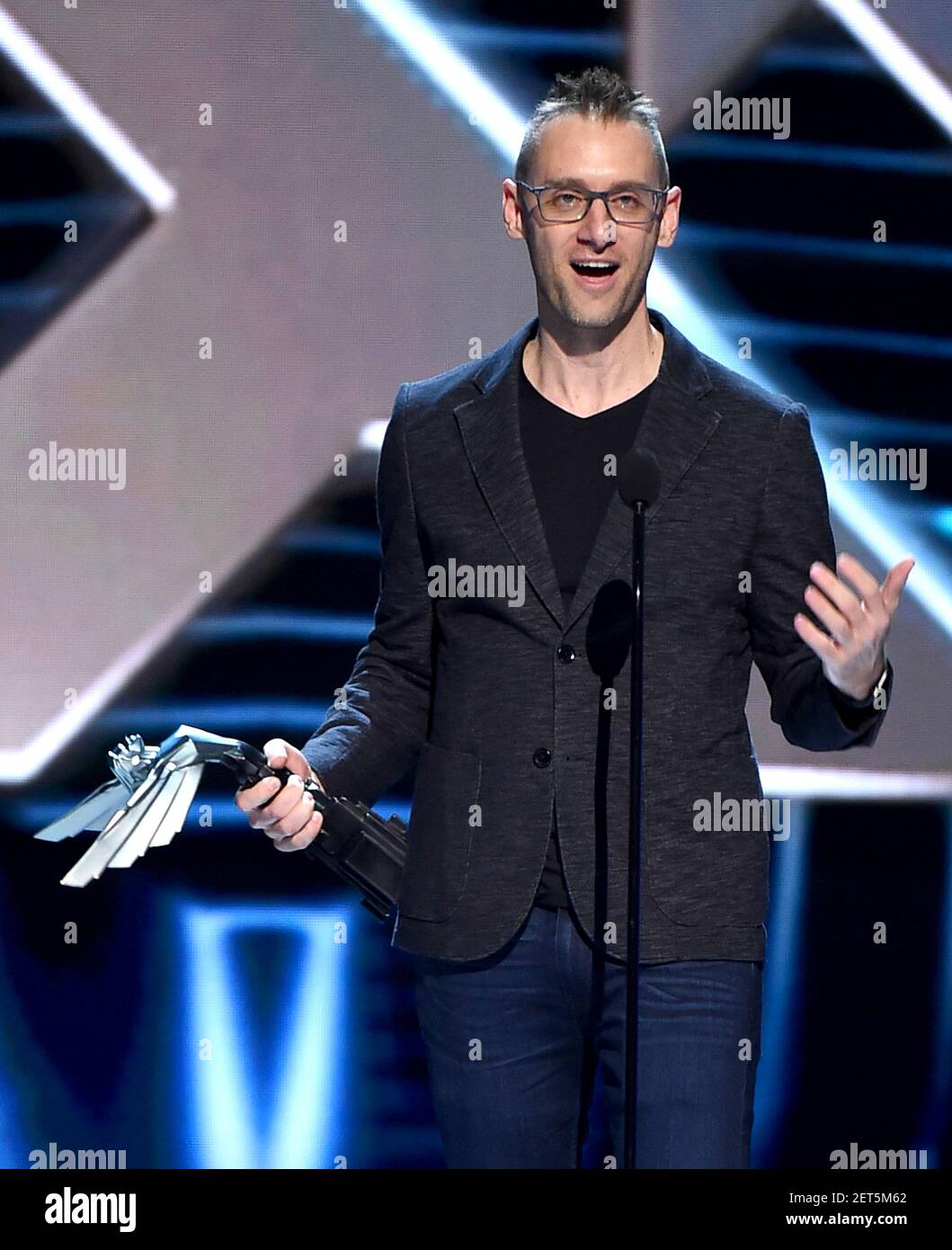 LOS ANGELES - DECEMBER 6: Donald Mustard accepts the Best Ongoing Game award  for “Fortnite” (Epic Games) at the 2018 Game Awards at the Microsoft  Theater on December 6, 2018 in Los