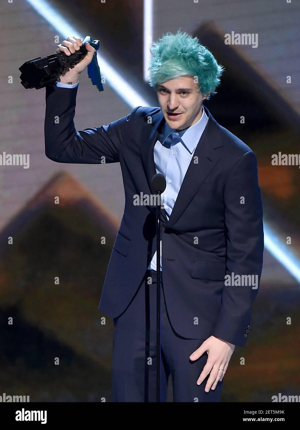 LOS ANGELES - DECEMBER 6: Presenters Sunny Sulijic and Christopher Judge  appear onstage at the 2018 Game Awards at the Microsoft Theater on December  6, 2018 in Los Angeles, California. (Photo by