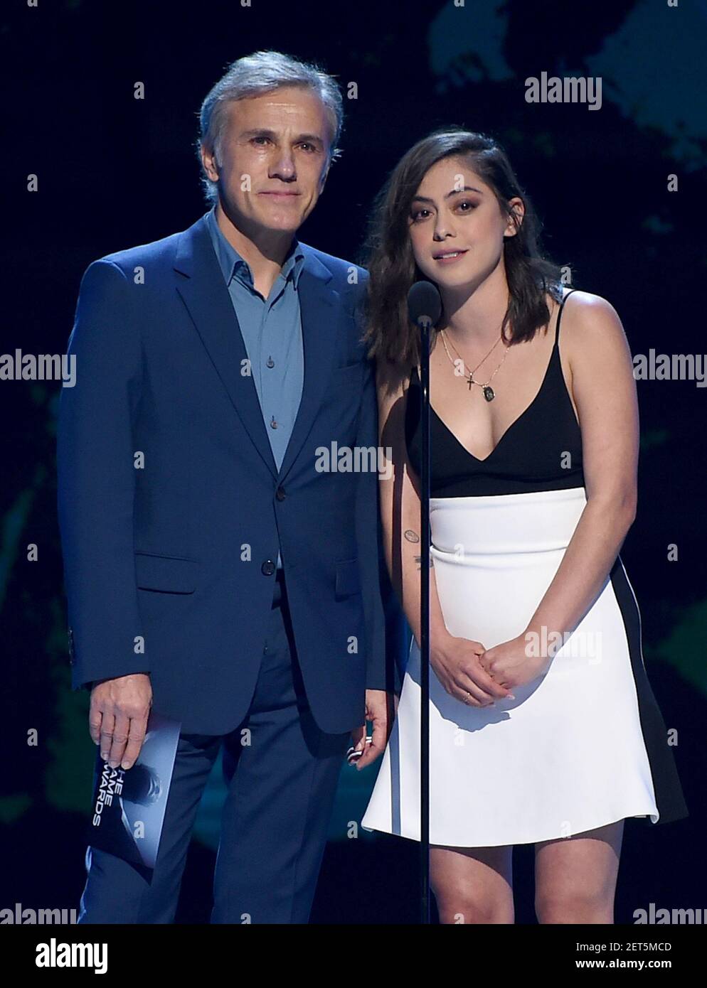 LOS ANGELES - DECEMBER 6: Presenters Christoph Waltz and Rosa Salazar  appear onstage at the 2018 Game Awards at the Microsoft Theater on December  6, 2018 in Los Angeles, California. (Photo by