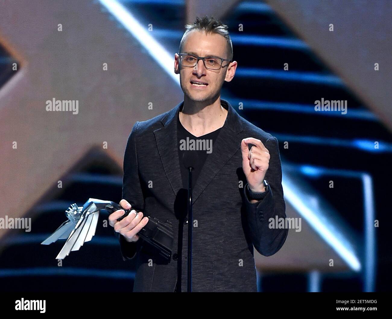 LOS ANGELES - DECEMBER 6: Donald Mustard accepts the Best Ongoing Game award  for “Fortnite” (Epic Games) at the 2018 Game Awards at the Microsoft  Theater on December 6, 2018 in Los