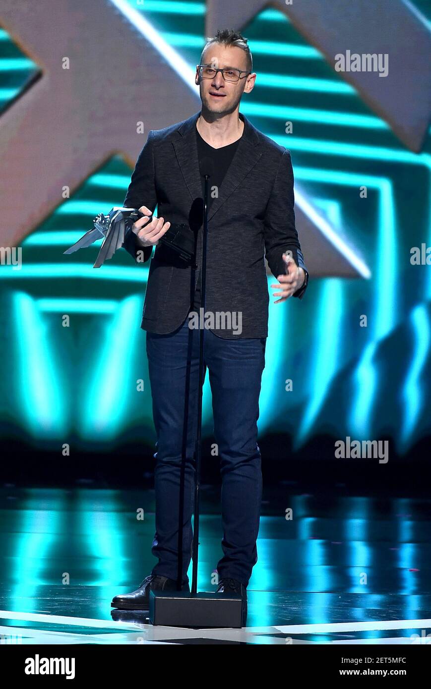 LOS ANGELES - DECEMBER 6: Donald Mustard accepts the Best Ongoing Game award  for “Fortnite” (Epic Games) at the 2018 Game Awards at the Microsoft  Theater on December 6, 2018 in Los
