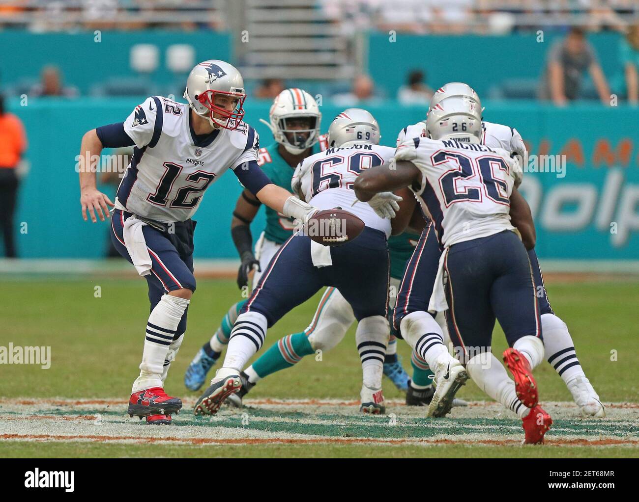 New England Patriots quarterback Tom Brady calls signals against the Miami  Dolphins at Landshark stadium in Miami on December 6, 2009 Stock Photo -  Alamy