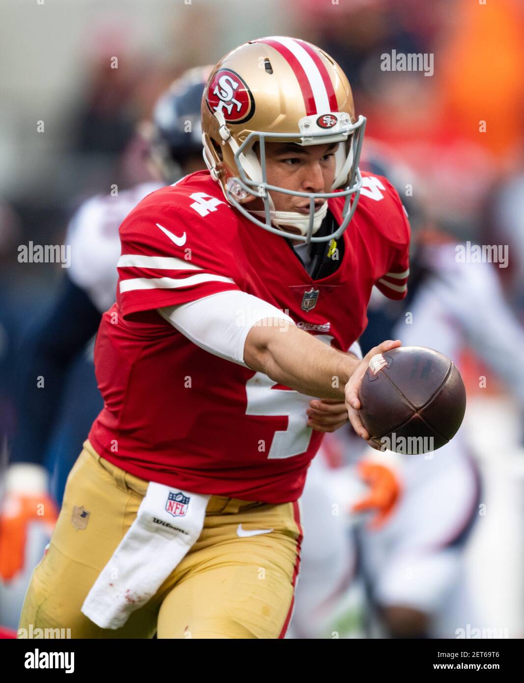 San Francisco 49ers linebacker Fred Warner wears cleats in honor of Mexico  during the first half of an NFL football game against the Arizona  Cardinals, Monday, Nov. 21, 2022, in Mexico City. (