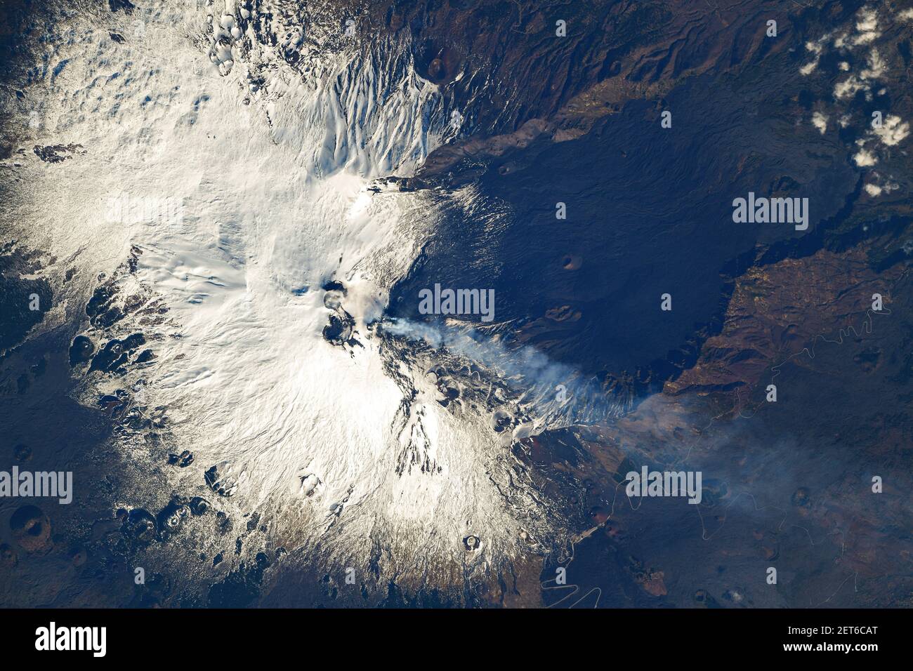 Mount Etna with a smoke plume, east coast of Sicily, Italy, Feb 3, 2021, from ISS, by NASA/DPA Stock Photo