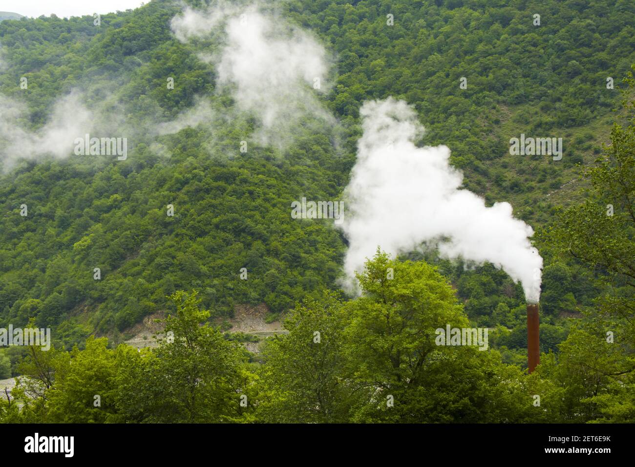 An industrial pollution, smog, and fog, large smoke pipe, toxic air