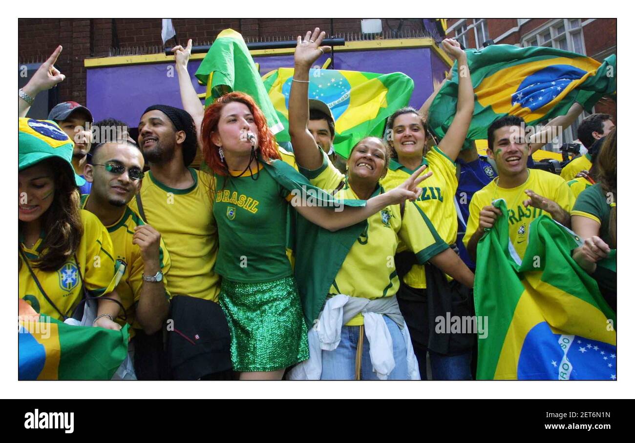 Brazil fans in Salsa Bar in London celebrate their win over England in