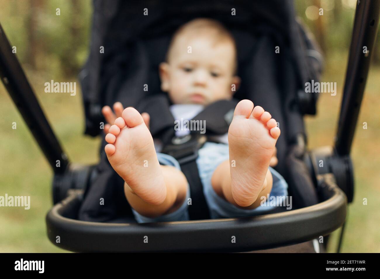 close-up of tiny baby feet happy family concept. Beautiful conceptual image caucasian kid foot Stock Photo