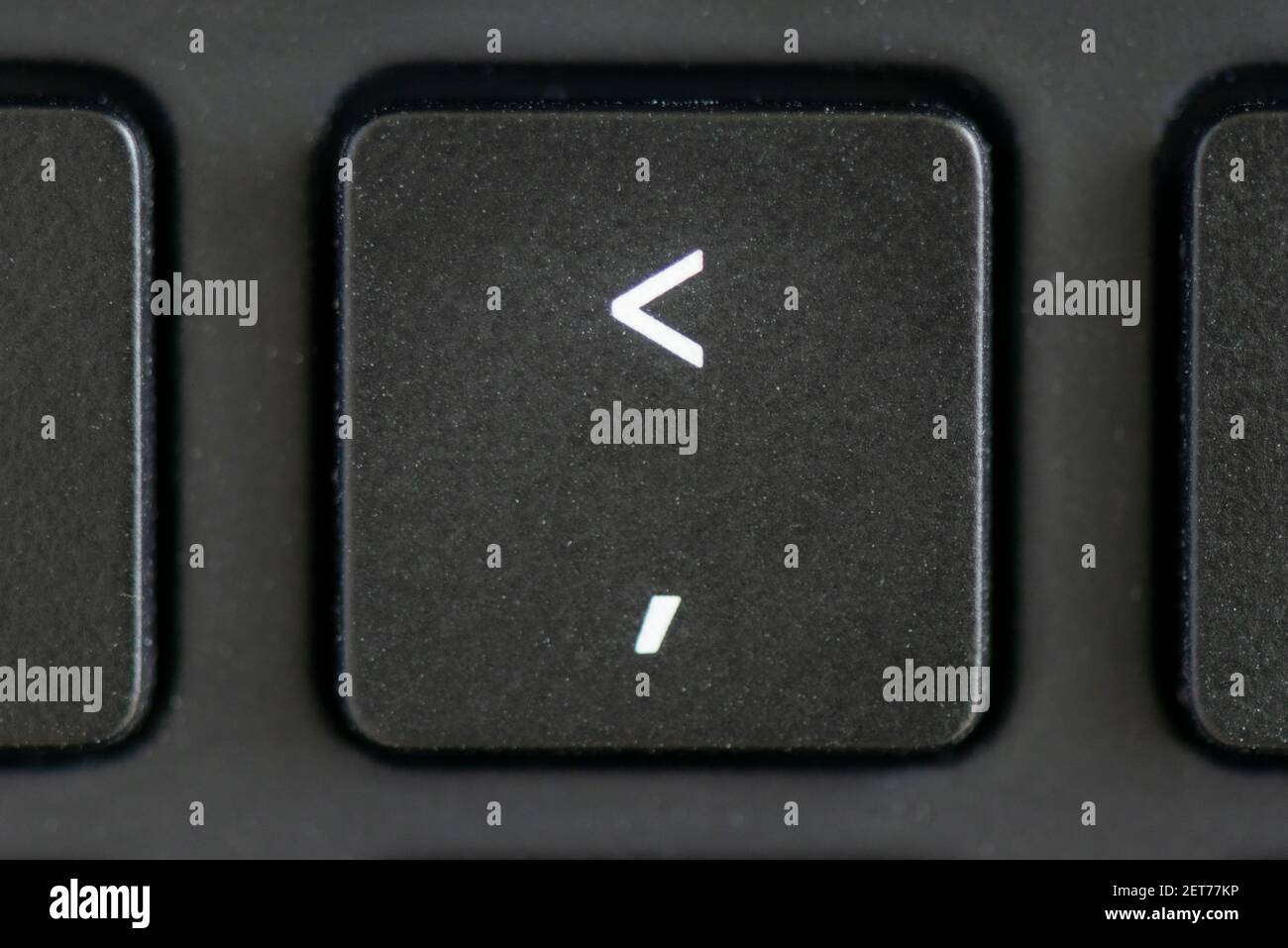 Comma key on a laptop keyboard Stock Photo - Alamy