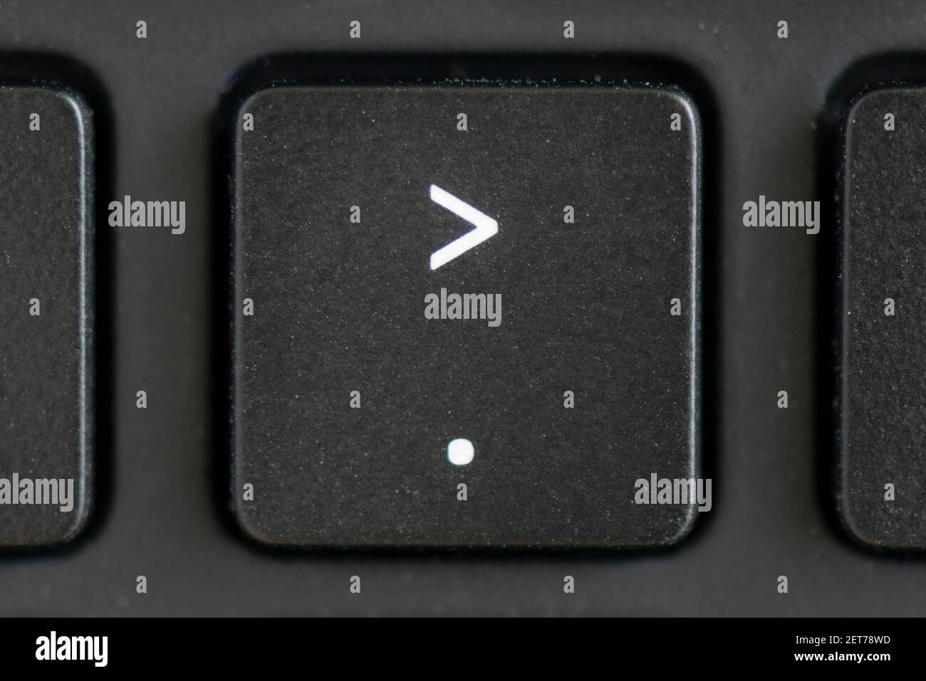 Full stop and angle bracket key on a laptop keyboard Stock Photo Alamy
