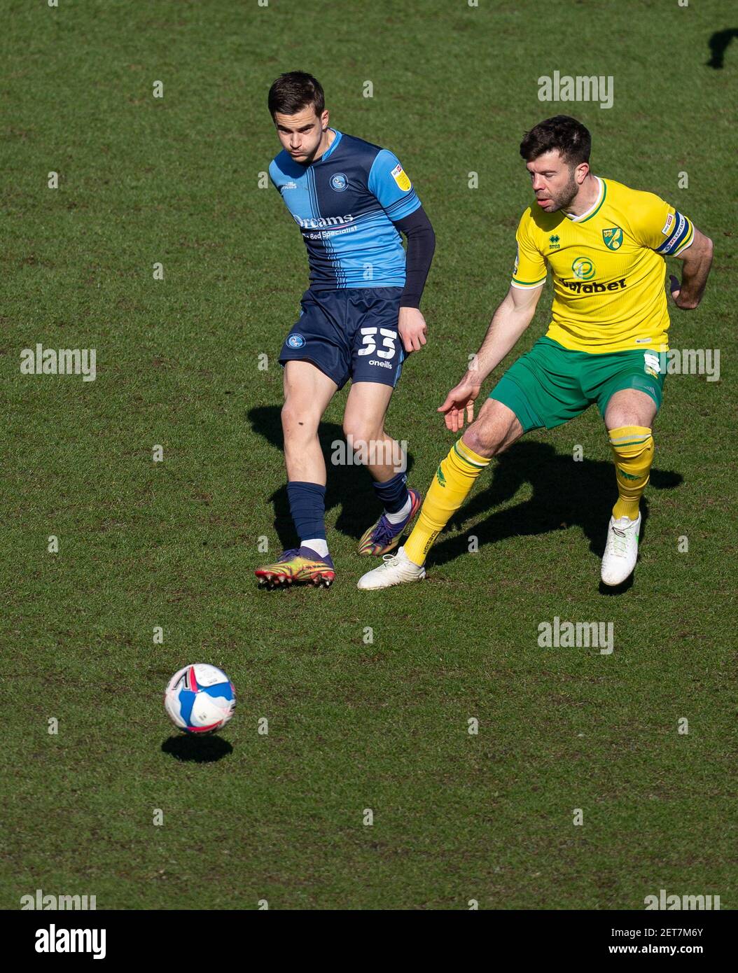 High Wycombe, UK. 28th Feb, 2021. Anis Mehmeti of Wycombe Wanderers & Grant Hanley of Norwich City during the Sky Bet Championship behind closed doors match between Wycombe Wanderers and Norwich City at Adams Park, High Wycombe, England on 28 February 2021. Photo by Andy Rowland. Credit: PRiME Media Images/Alamy Live News Stock Photo