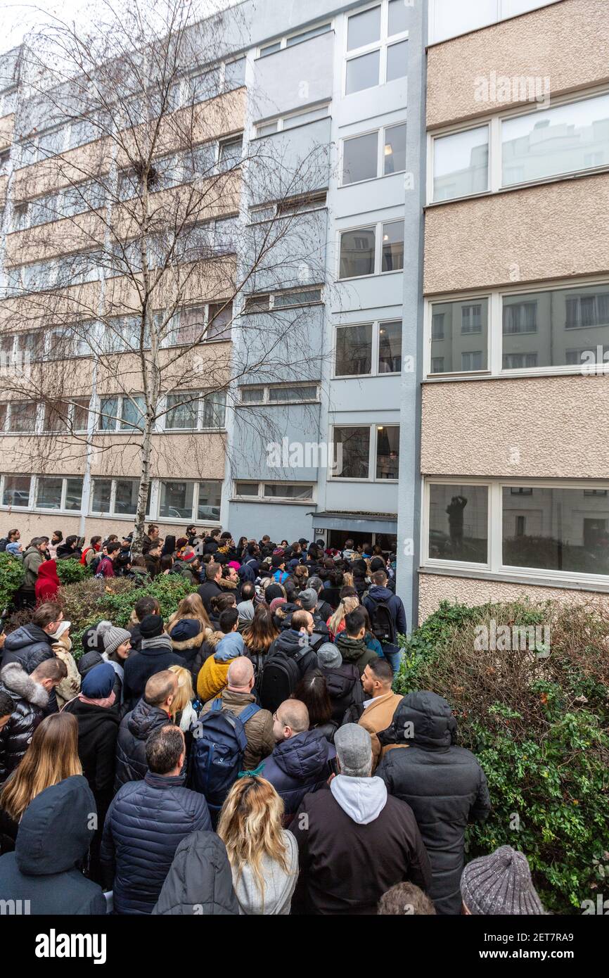 People line up for viewing of an apartment for rent in Kreuzberg