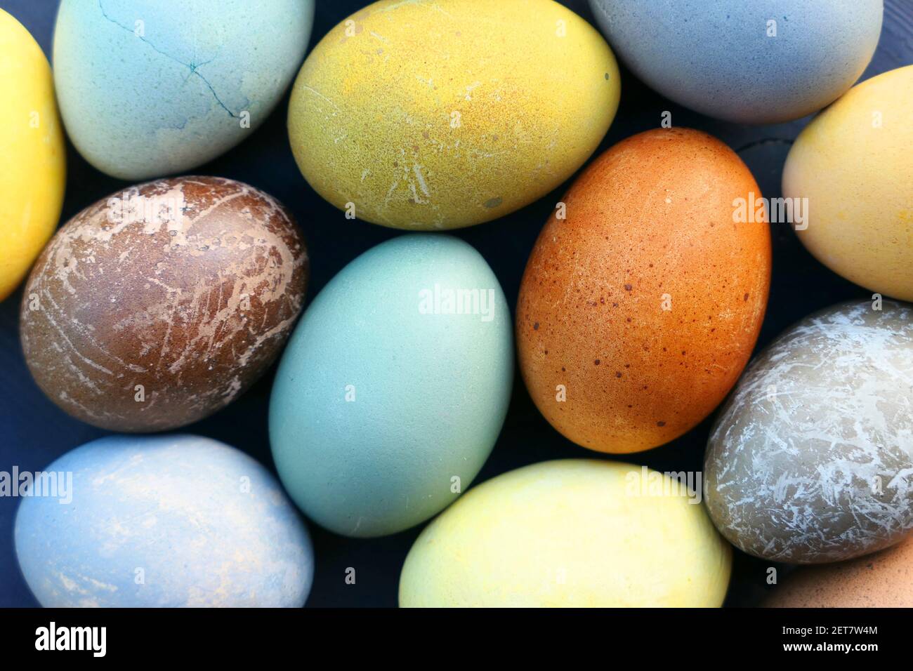 Easter eggs colorful collection. Natural dyed Easter eggs background. Stock Photo