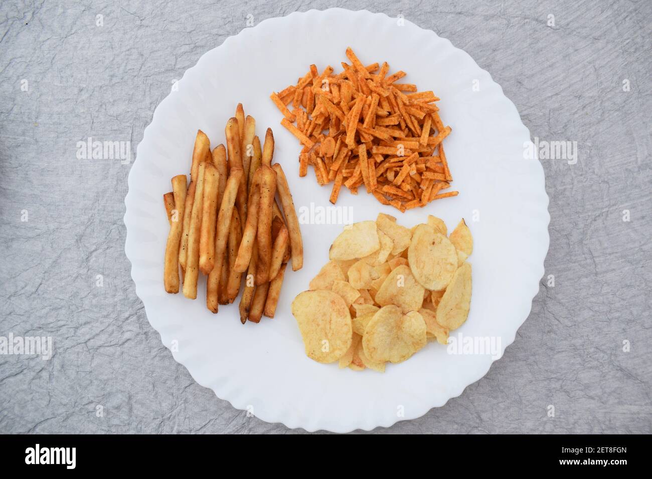 Indian fasting recipe items, Upawas food for navratri, maha shivratri, ekadashi also known as vrat ka khana. All made out of potatoes. Potato chips, f Stock Photo