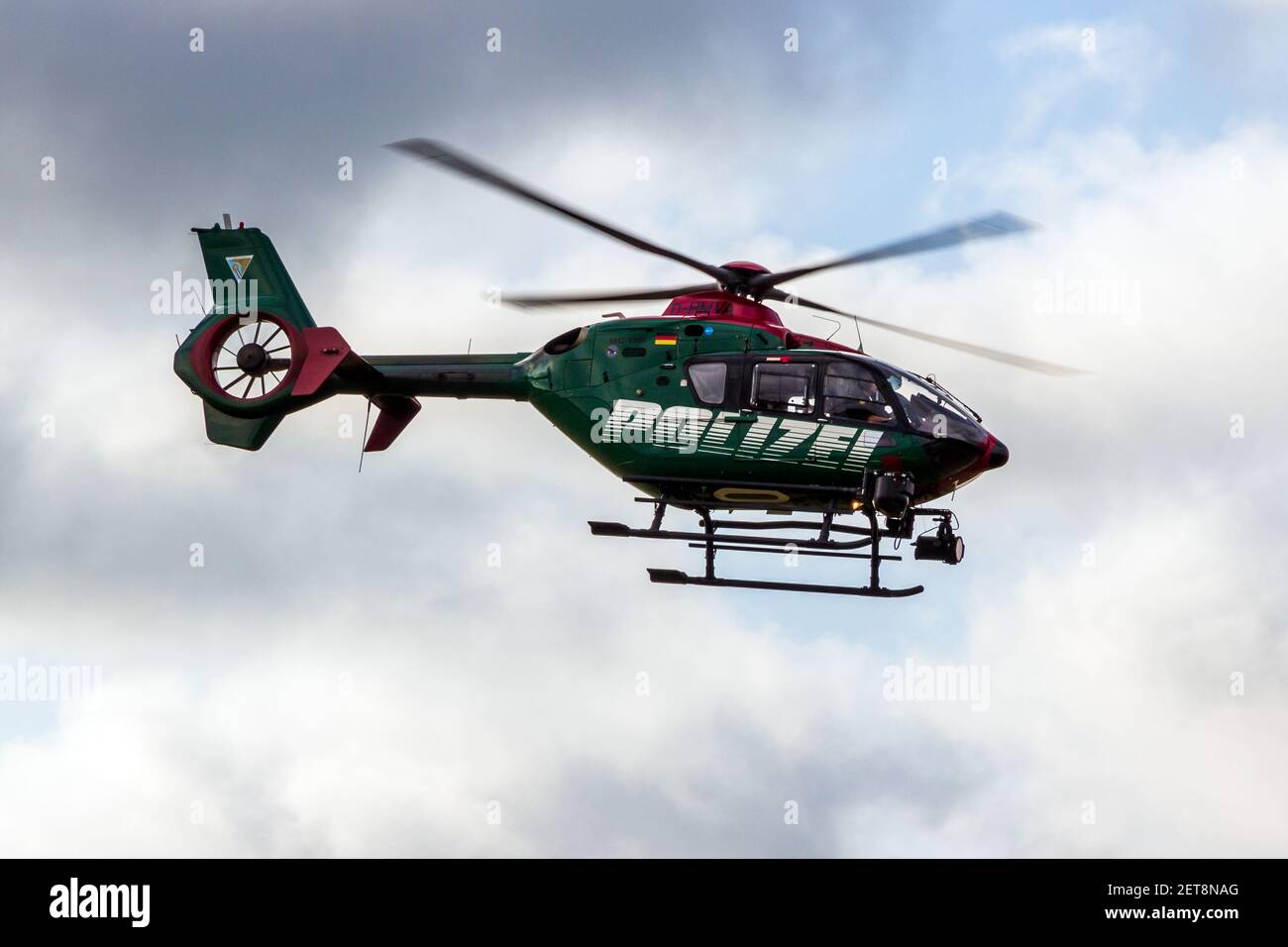 German Police EC-135 helicopter in flight. Laage, Germany - August 23, 2014 Stock Photo