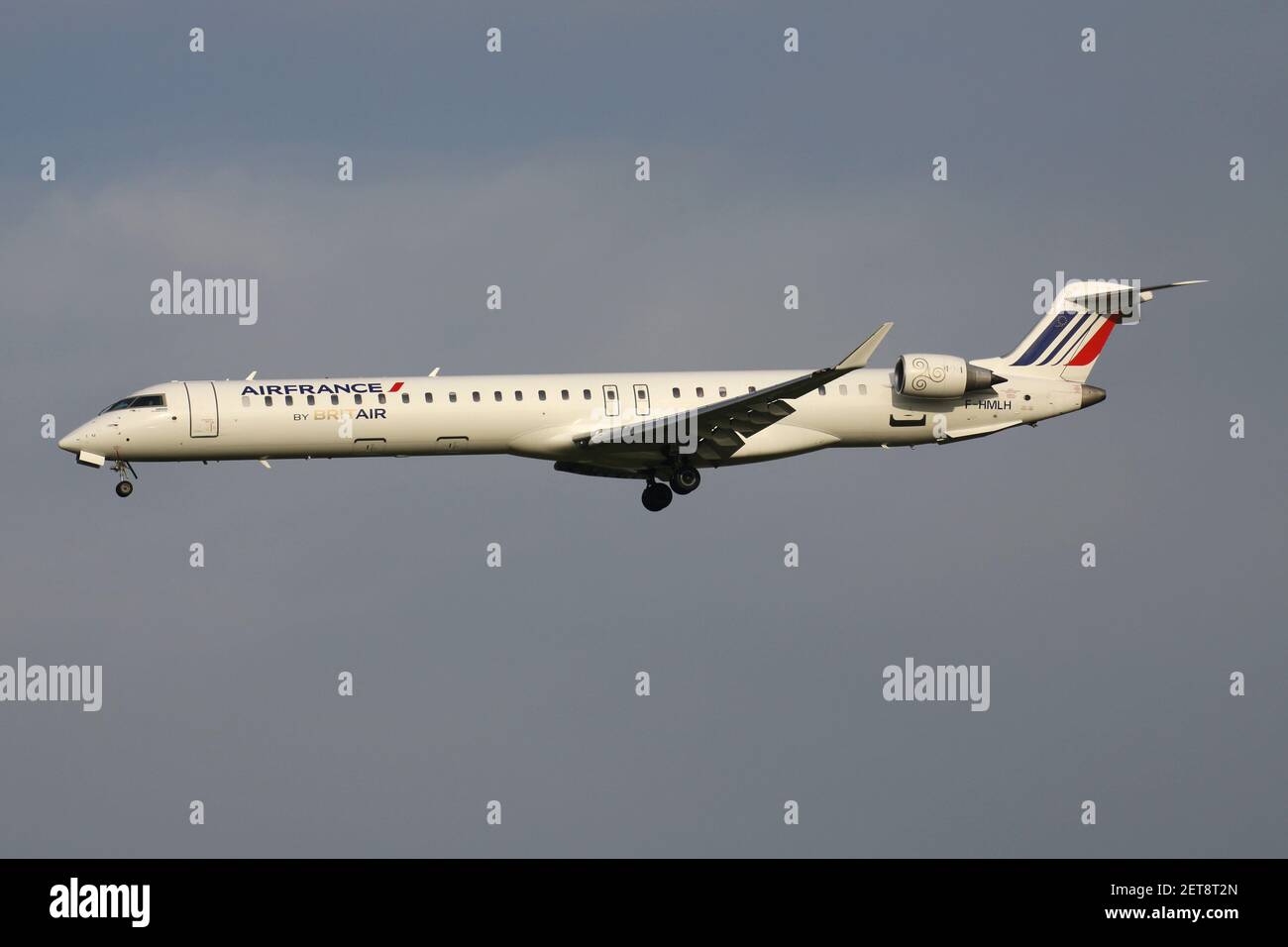 Brit Air Bombardier CRJ1000 in Air France livery with registration F-HMLH on short final for Amsterdam Airport Schiphol. Stock Photo