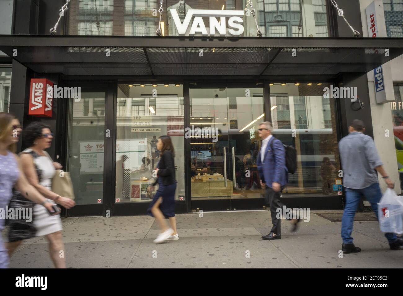 A Vans footwear store in Herald Square in New York on Friday, May 4, 2018.  VF Corp, owner of iconic brands Vans, North Face, Timberland, the closing  Henri Bendel and a multitude
