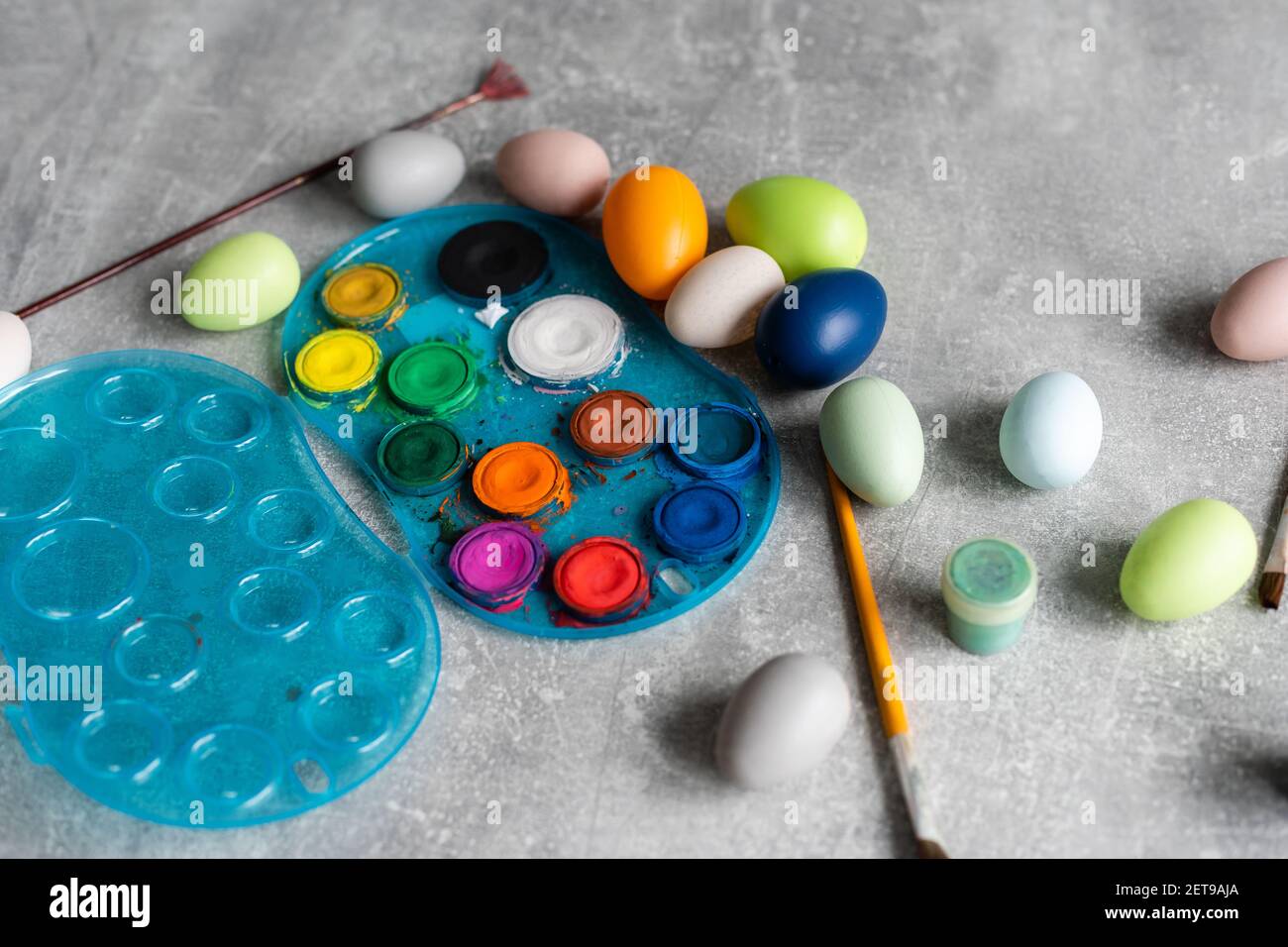 colouring eggs for eastertime at home Stock Photo