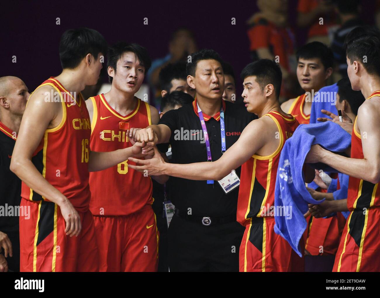 FILE--Coach Li Nan, front, reacts during a game against Philippines in  Jakarta city, Indonesia, 21 August 2018. After the poor performance during  the games in 2019 FIBA World Cup, the coach Li