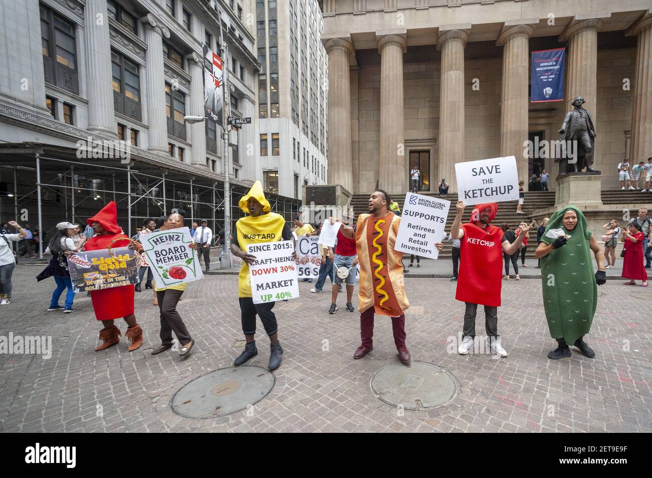 Protesters from Krupa Global Investments dressed as iconic ketchup and mustard bottles protest on Wednesday, September 12, 2018 the management of the Kraft Heinz Company by Berkshire Hathaway and 3G Capital, fearful that the investors are abandoning the company. (Photo by Richard B. Levine) Stock Photo