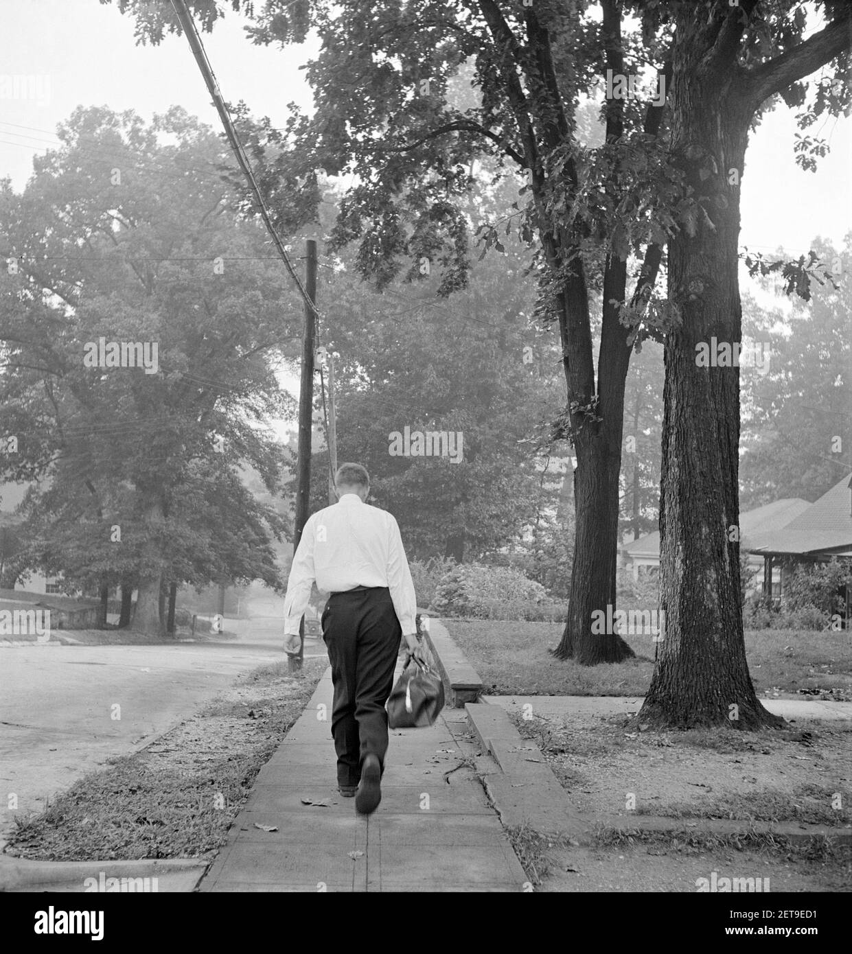 George Camblair leaving home to go to Selective Service Board with about fifty others, who will leave by train for Induction Station, Washington, D.C., USA, Jack Delano, U.S. Office of War Information, September 1942 Stock Photo