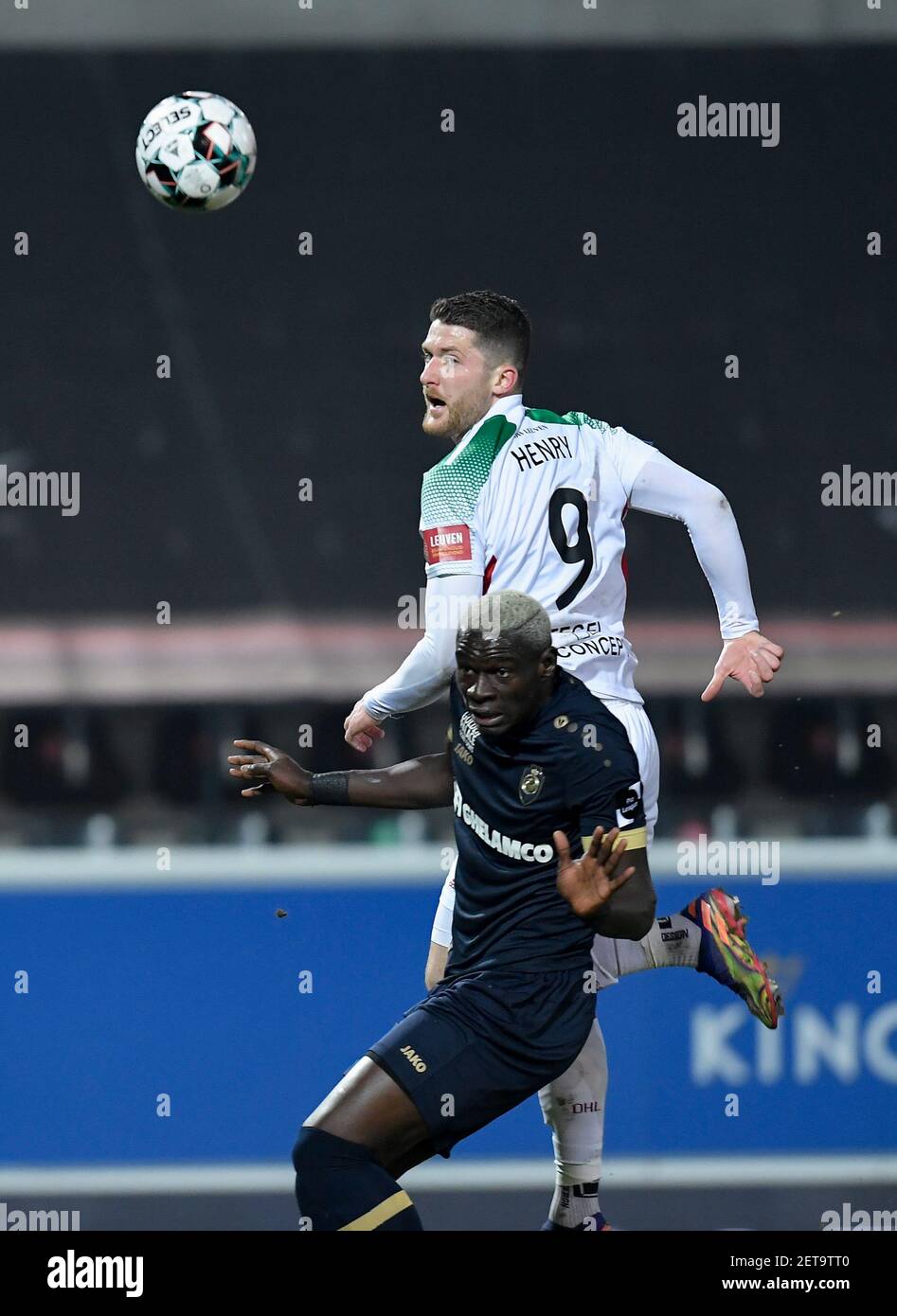 OHL's Thomas Henry and Antwerp's Abdoulaye Seck fight for the ball