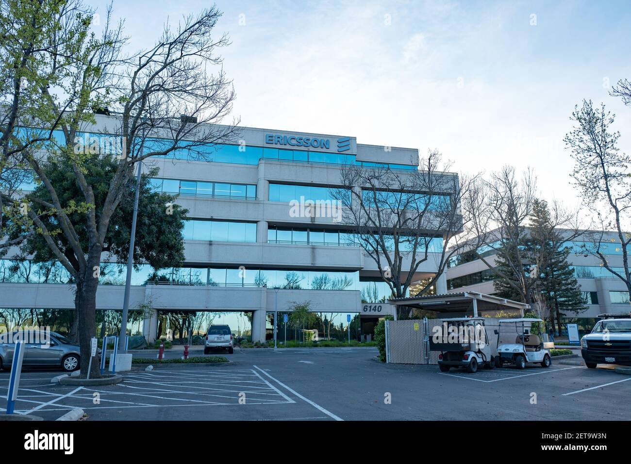 Facade with sign and logo at regional headquarters of mobile device