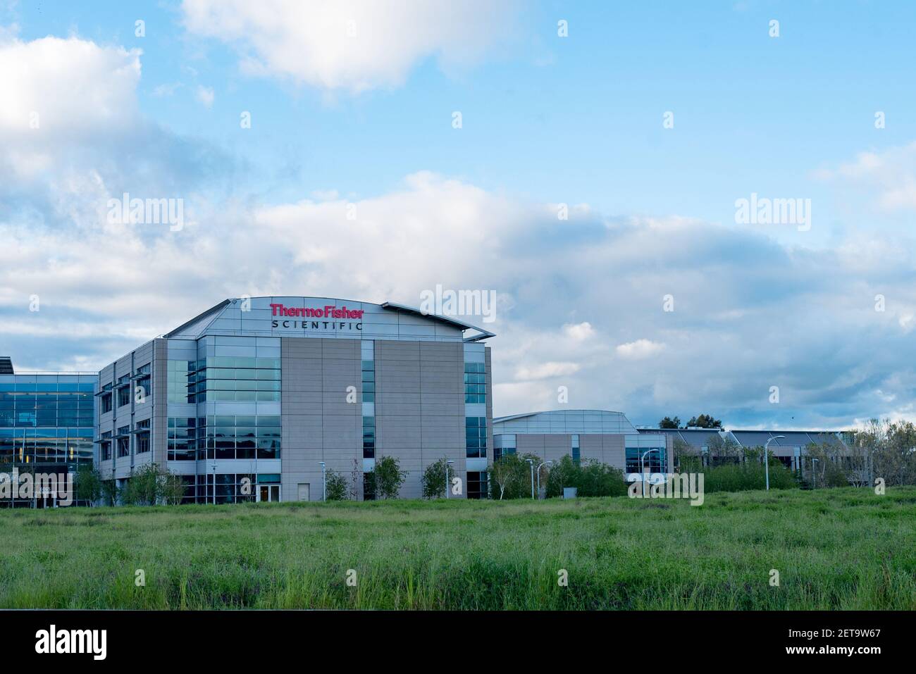 Facade with sign and logo at the regional headquarters of biotechnology  company Thermo Fisher Scientific in Pleasanton, California, April 16, 2018.  (Photo by Smith Collection/Gado/Sipa USA Stock Photo - Alamy