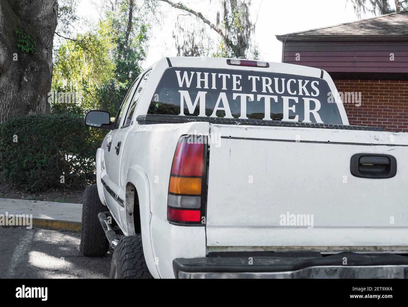 White Trucks Matter sign in the back window  of a pickup truck in North Florida, in answer to Black Lives Matter movement Stock Photo