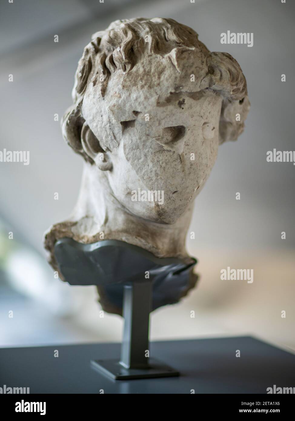 War Damaged Statues - The head of Prometheus from a gallery in Dresden Germany, damaged in a WW2 bombing raid in 1945. Displayed at IWM Duxford. Stock Photo