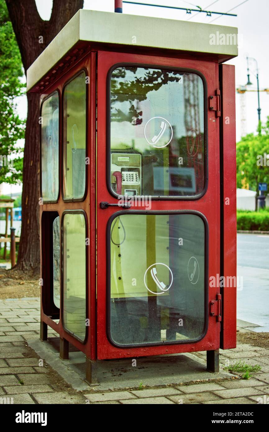 Old telephone booth in Budapest, Hungary. An old public phone in