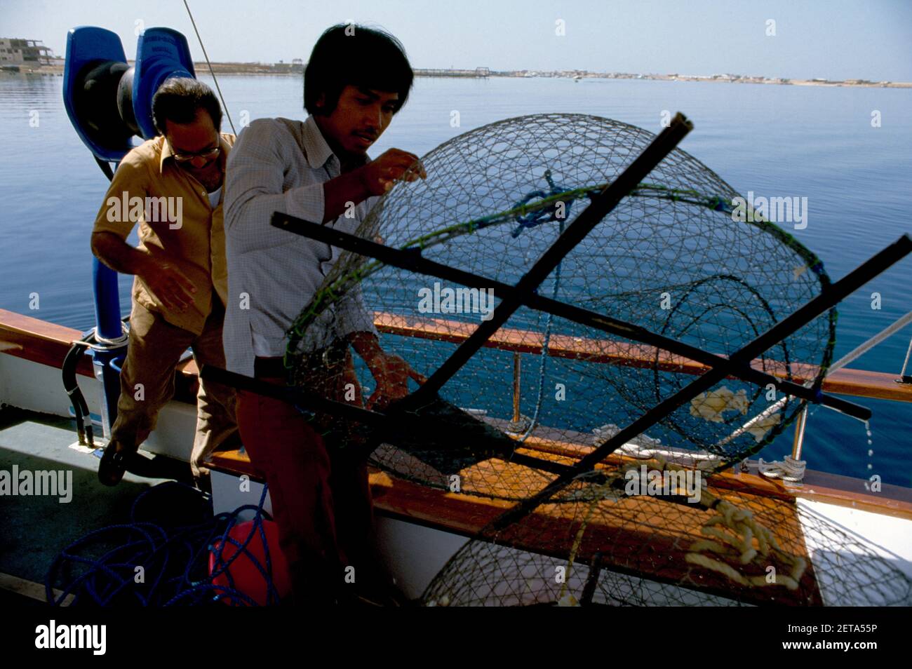 Fishermen on fishing boat Dubai UAE Stock Photo Alamy