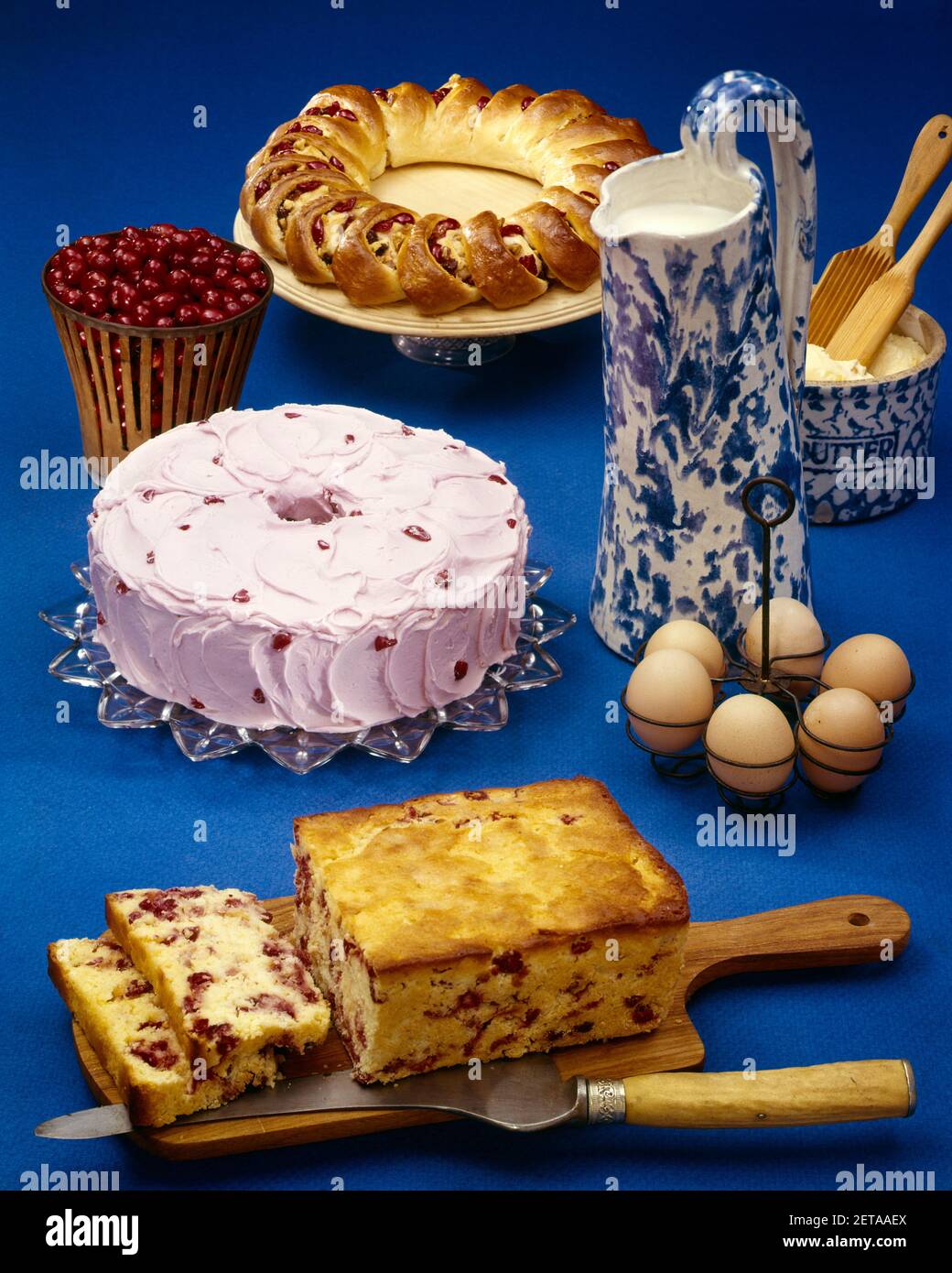 1980s CHERRY BREAKFAST RING ANGEL FOOD CAKE WITH CHERRY ICING LOAF OF CHERRY BREAD INGREDIENTS EGGS MILK FLOUR - kf21245 PHT001 HARS OLD FASHIONED Stock Photo