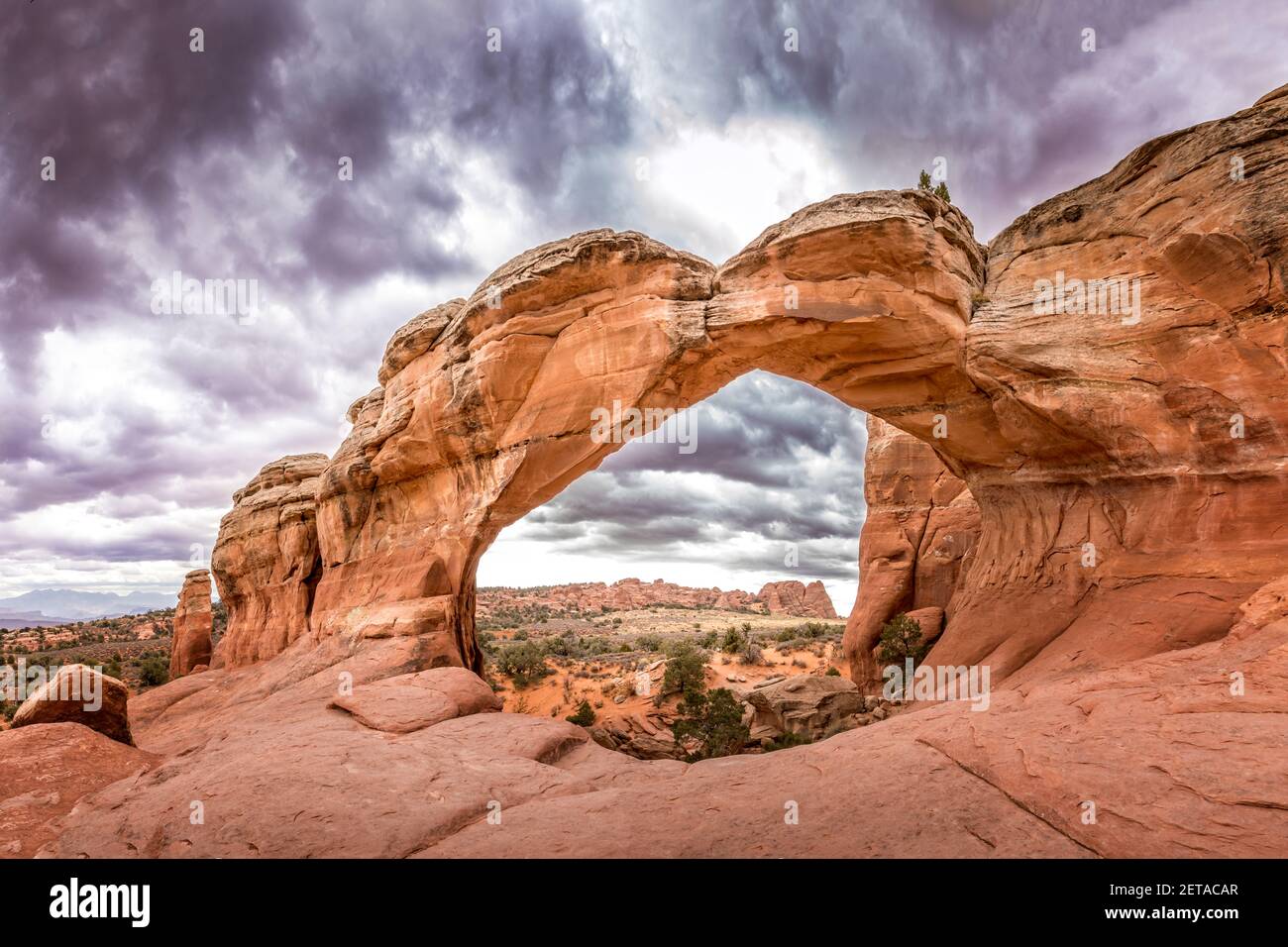 The famous Broken Arch in the Arches National Park, Utah and dramatic