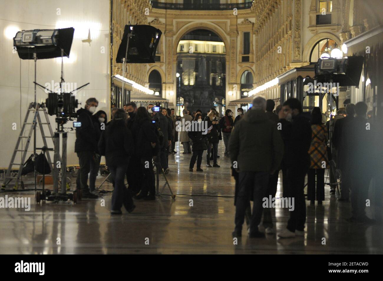 Milan, Set of the tv film L'amica geniale 3 This evening some scenes of the 3 series of "L'AMICA GENIALE" broadcast on RAI 1 took place in Milan. In the photos MARGHERITA MAZZUCCO, one of the 2 leading actresses, the other GAIA GIRACE absent in these shots, which took place on the highly armored set of Galleria Vittorio Emanuele. Stock Photo