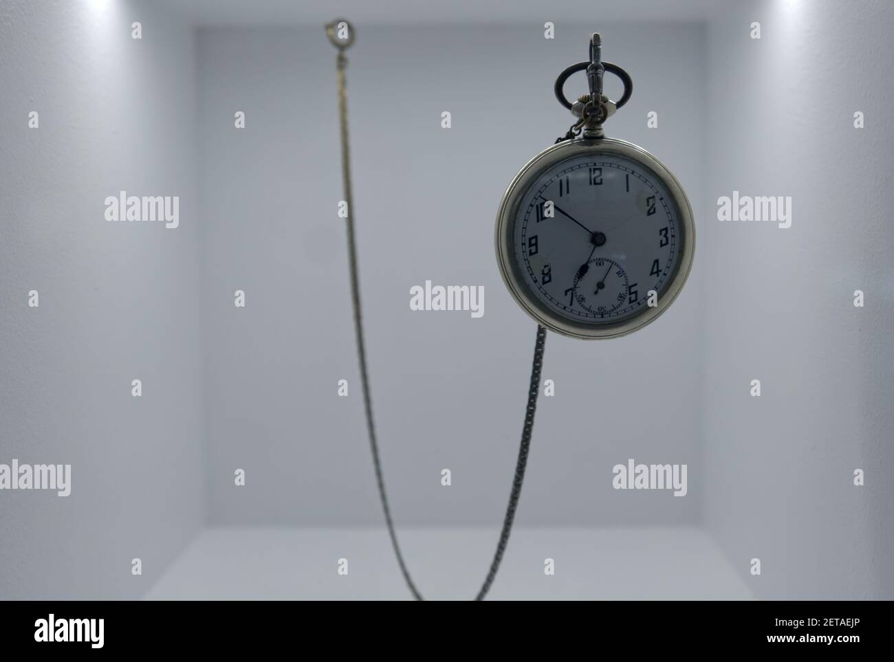 a luxury vintage pocket watch hanging in a case Stock Photo Alamy