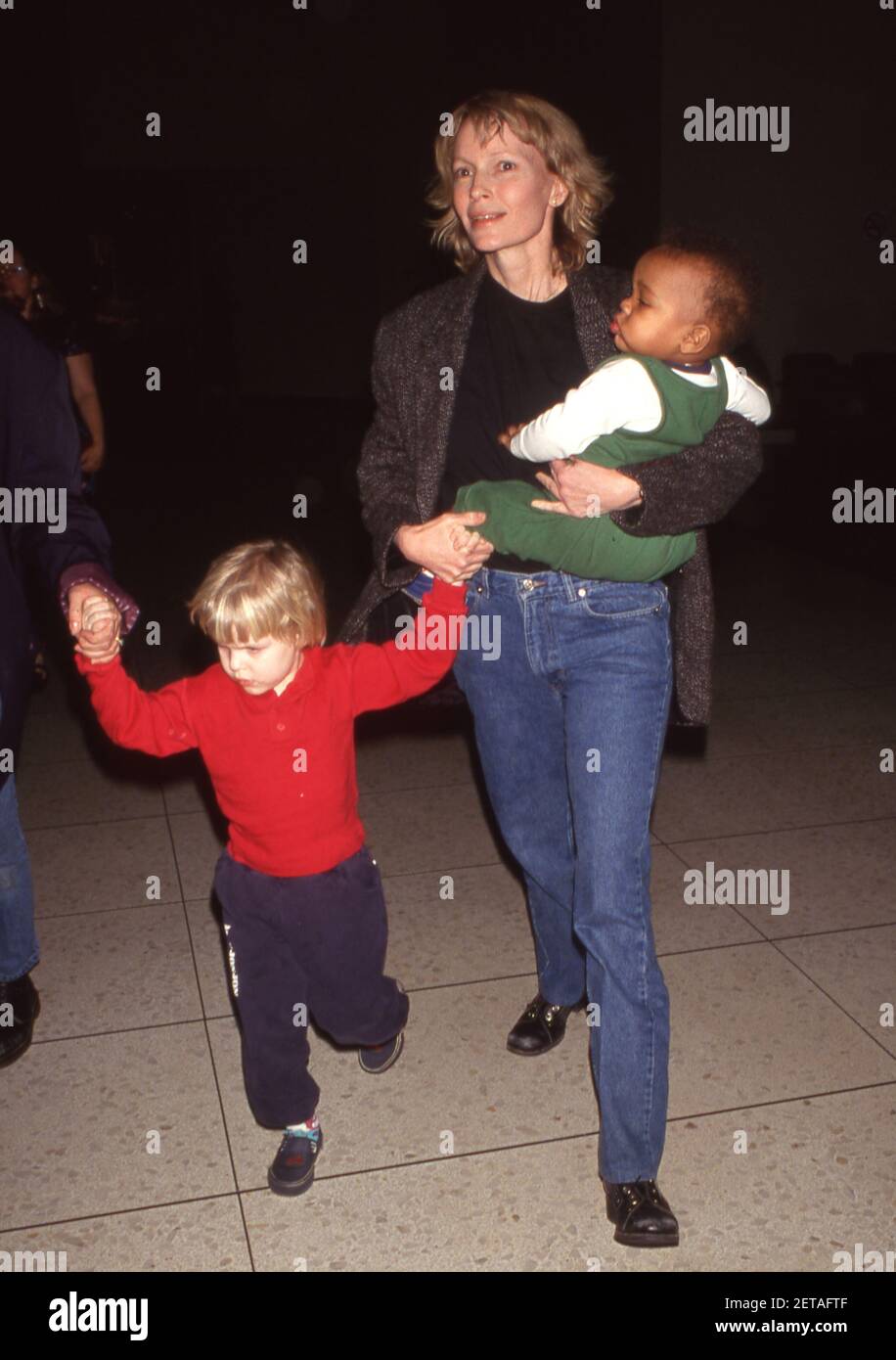 LOS ANGELES, CA FEBRUARY 4 Mia Farrow with Ronan Farrow and Isaiah