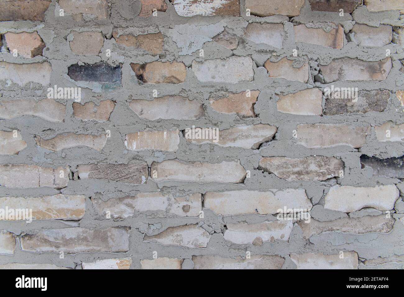 A close up of a brick wall. White sand-lime brick fence. Brick texture. Figured brickwork Stock Photo