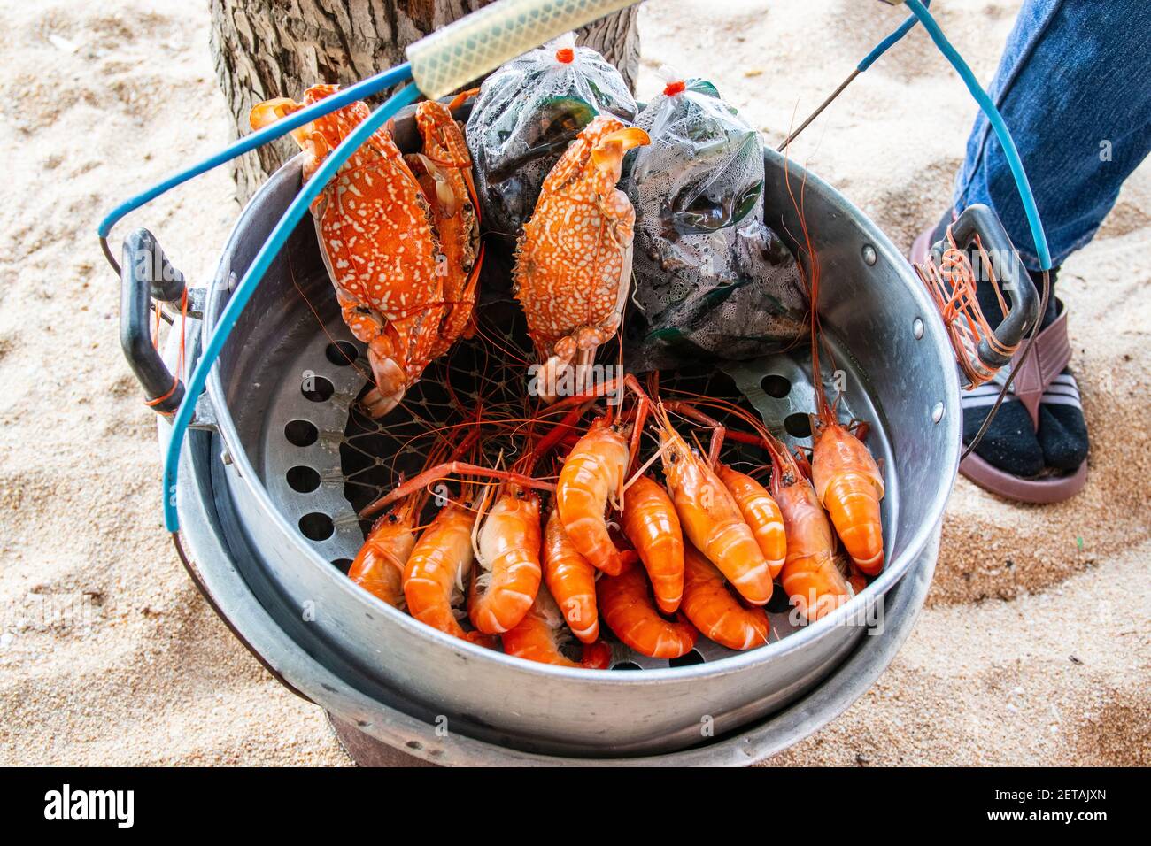 A high angle shot of crab and shrimp in a steamer Stock Photo Alamy