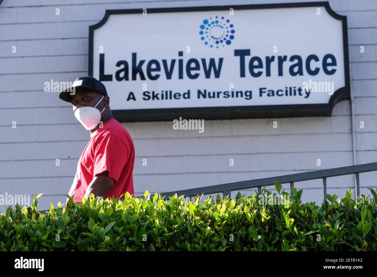 Los Angeles, California, USA. 1st Mar, 2021. A man waeing a face mask is seen at Lakeview Terrace Skilled Nursing Facility in Los Angeles, March 1, 2021. Los Angeles City Attorney Mike Feuer announced today his office reached a settlement with Lakeview Terrace Skilled Nursing Facility, which was accused of patient dumping during the COVID-19 pandemic, as well as abuse, neglect, denial of care and efforts to conceal its conduct. Credit: Ringo Chiu/ZUMA Wire/Alamy Live News Stock Photo