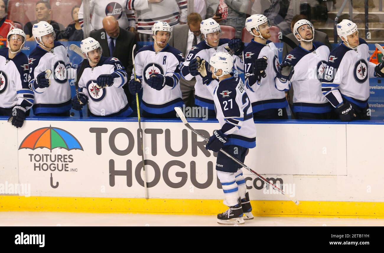 Jan 26, 2021; Winnipeg, Manitoba, CAN; Winnipeg Jets left wing Nikolaj  Ehlers (27) and Winnipeg Jets goaltender Connor Hellebuyck (37) celebrate  their win over the Edmonton Oilers at Bell MTS Place. Mandatory